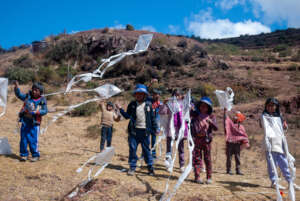 Happy faces after making their own handmade kites