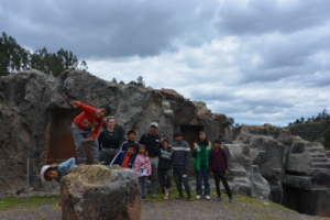 Kids visiting the Inkiltambo ruins near Killarayan