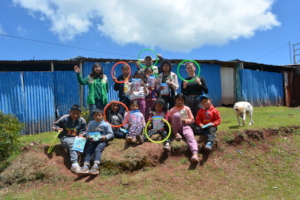 Excitedly opening Christmas gifts in Quillahuata