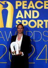 Jellina Kuellen accepting the award