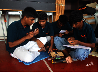 Boys hard at work assembling their kit