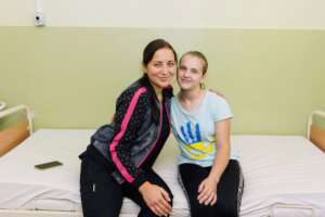 Liza with her doctor