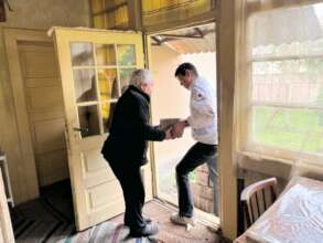 Carrying firewood inside the house