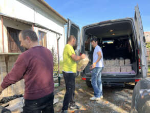 Loading firewood into a car