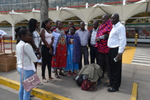 Sharon's family brings her to the Nairobi airport
