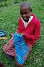 A student working on her quilt panel