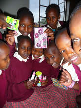 Top Spelling Bee finishers showing off prizes