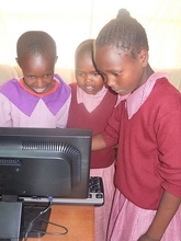 Students working together in the computer lab