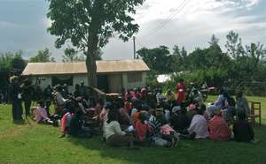 Parents listening to updates from Kakenya