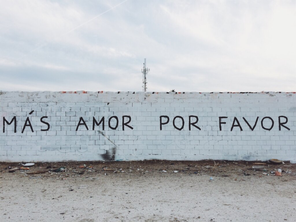 English Translation: "More love, please."
