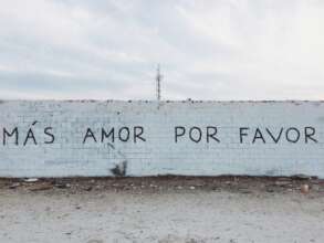 English Translation: "More love, please."