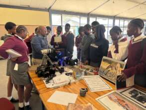 Students get hands-on with camera equipment.