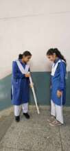 Halima and Mehrab testing the blind stick