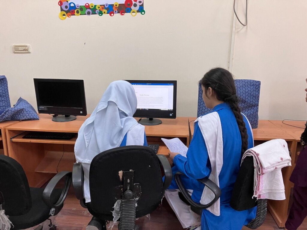 Students digitizing content for the magazine