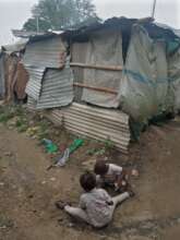 A BOY WHO NEEDS ASSISTANCE TO BUILD A DESCENT HOME