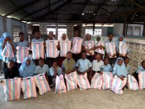 children receiving bar soaps