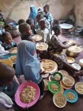 CHILDREN ENJOYING FEEDING PROGRAM