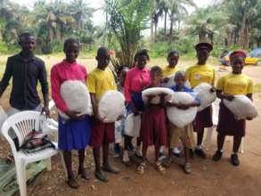 Bed nets distributed to students in Mayaya Village