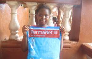 Mariama is thankful for her bed net