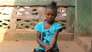 Sad Ruguiatu scratches away at mosquito bite area