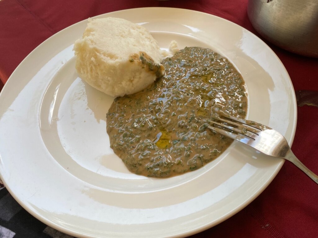 Maize ugali served with pasted malakwang