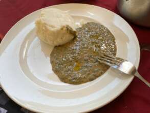 Maize ugali served with pasted malakwang