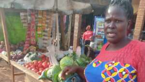 Beneficiary at her vegetables stall