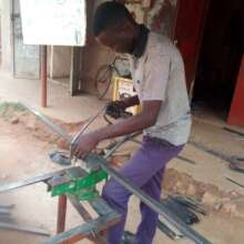 Okello during his welding apprenticeship
