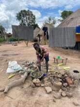 Child making bread from harvested crops