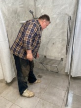 A bench was installed in the shower room