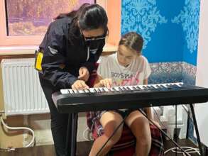 Tanya with her new piano