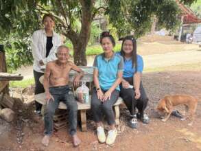 Ying, on the left, visits our elders
