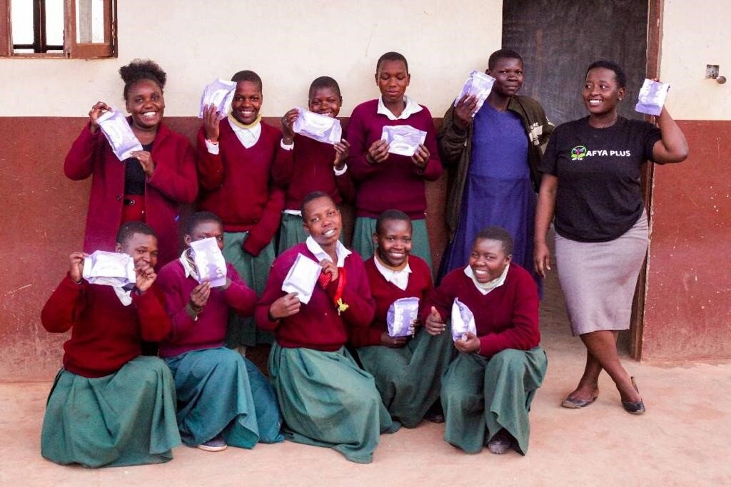 Girls from Lulanzi receiving their sani pads