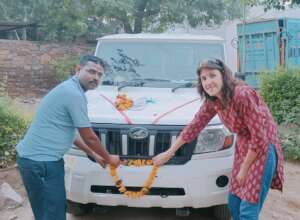 Founder Rachel & driver Kuldeep with the new truck
