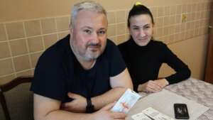 Oleksii Holds RA Medicine That Changed His Life