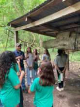 Marcos teaching children about native beekeeping