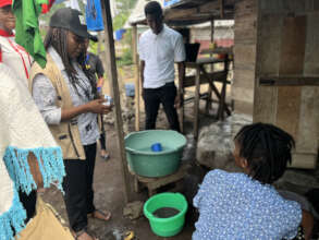 A woman in Limbe receives sensitization on cholera