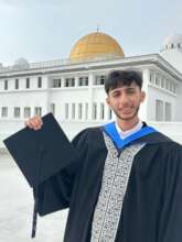 Yazan on his graduation day at the AIU campus