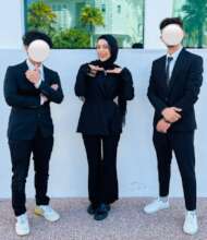 Hanaa posing with her FYP group mates