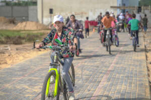 Children in Gaza join a solidarity ride on July 29