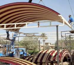 Setting up a canopy to shelter from hot sun