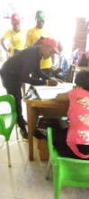 Our Project Leader signing attendance register