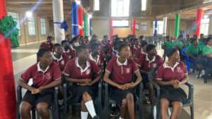 Students listening to a workshop on menstruation