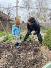 Prepping a garden with all smiles