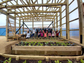 Childrens and teachers learning in a greenhouse