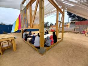 Group of children listen a worm tale