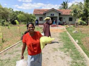 Residents bring home food packages