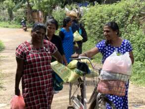 Women in Piliyadi after receiving food support