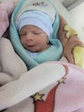 Welcoming a newly delivered baby at our clinic