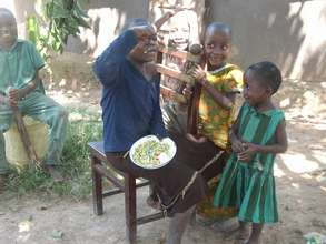 Children enjoying meals .